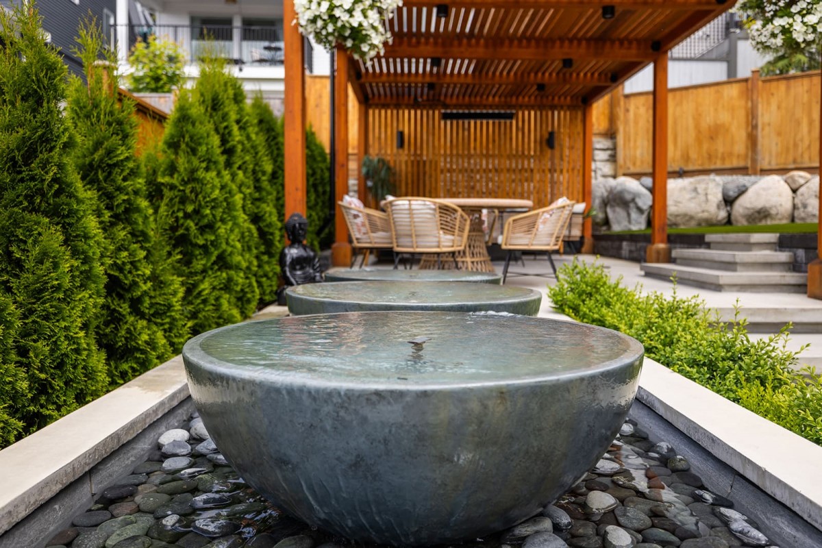 This custom water feature is designed to attract wildlife and enhance the landscape’s sensory experience. It adds a lively element while strengthening our connection to nature in an urban setting.
